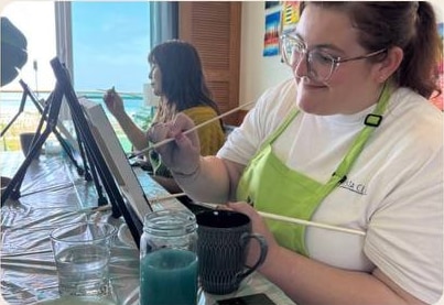 Guest painting during a Pinto Beetle class