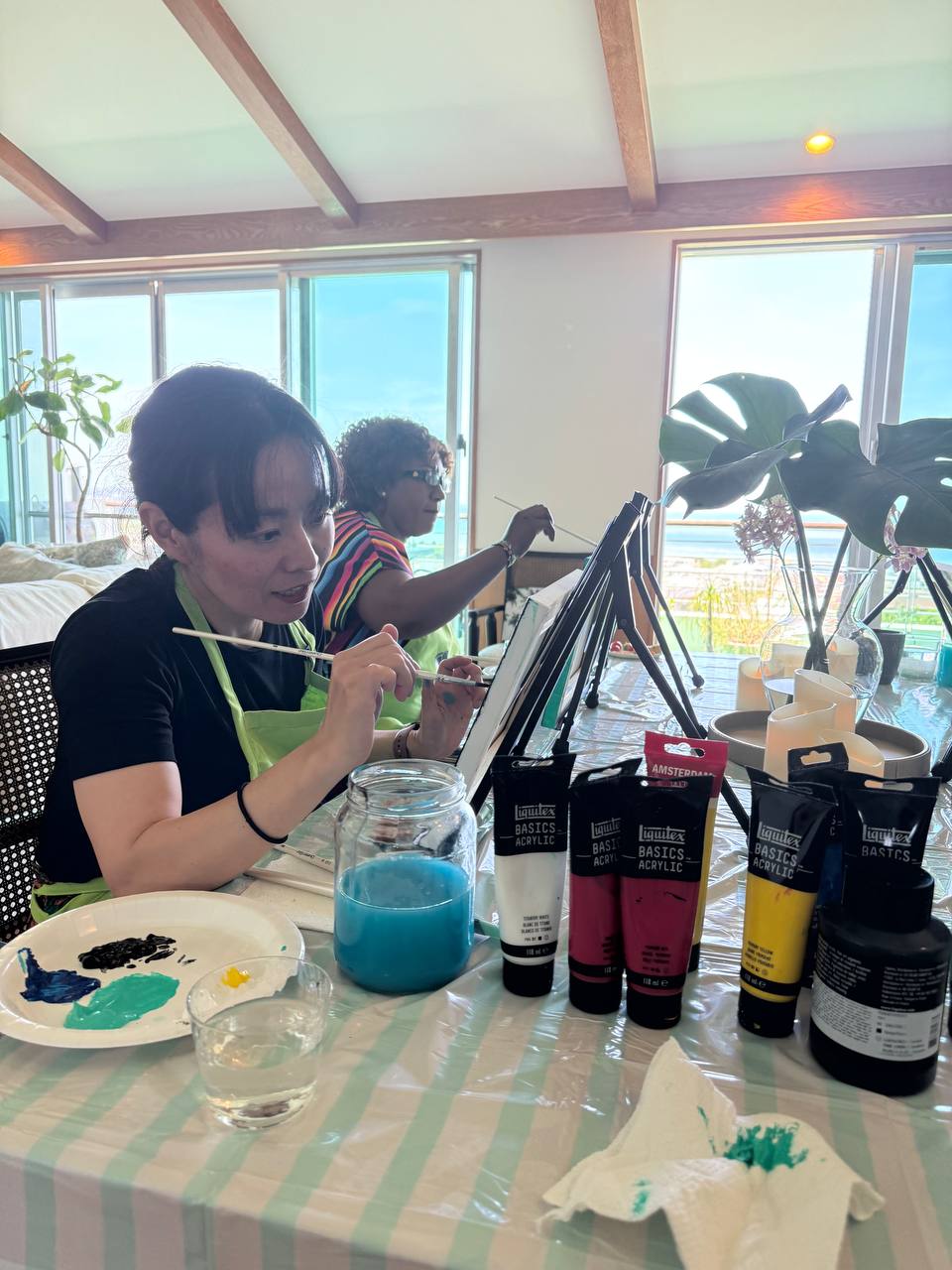 Pinto Beetle workshop scene with guests painting together